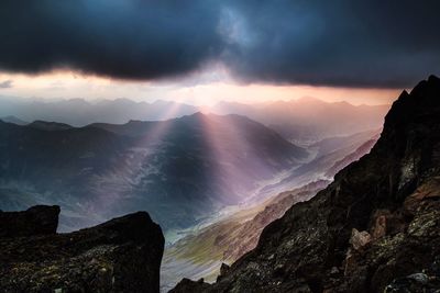 Scenic view of mountains against sky during sunset