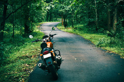 Man riding motorcycle on road