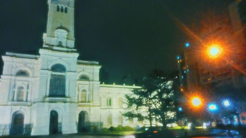 View of illuminated city at night