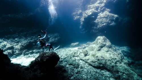 Man swimming undersea