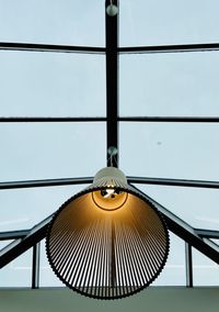 Low angle view of pendant light hanging from ceiling