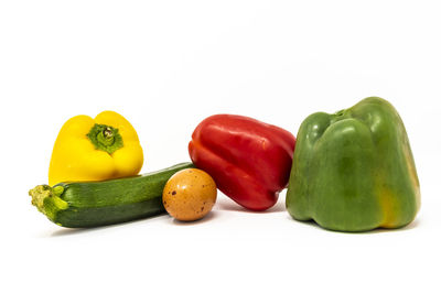 Close-up of bell peppers against white background