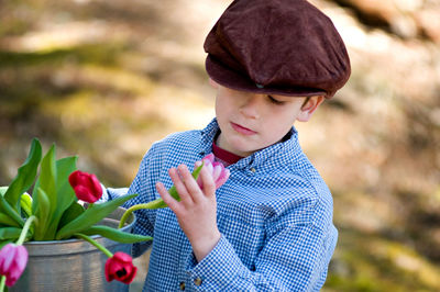Close-up of baby girl with flowers