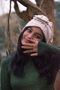 Close-up of young woman during winter