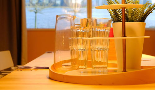 Close-up of beer glass on table
