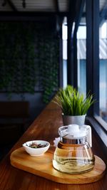 Potted plant on table at home