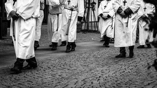 People walking on street in city