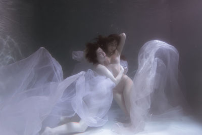 Digital composite image of woman dancing