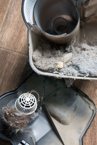 High angle view of coffee cup on floor