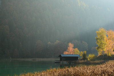 Scenic view of lake against sky during autumn