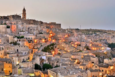 Aerial view of old town in city against sky