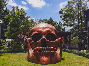 Sculptures on land in park