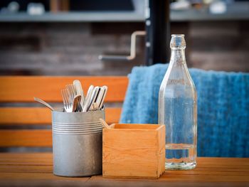 Close-up of objects on table in kitchen