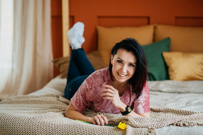 Young woman enjoys herself during self-isolation, lockdown, because of covid19 pandemic.