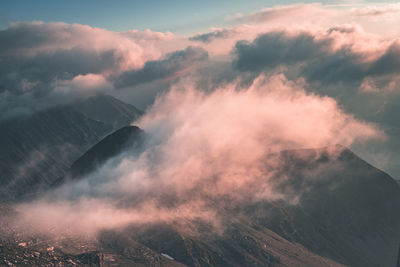 Low angle view of mountain against sky during sunset