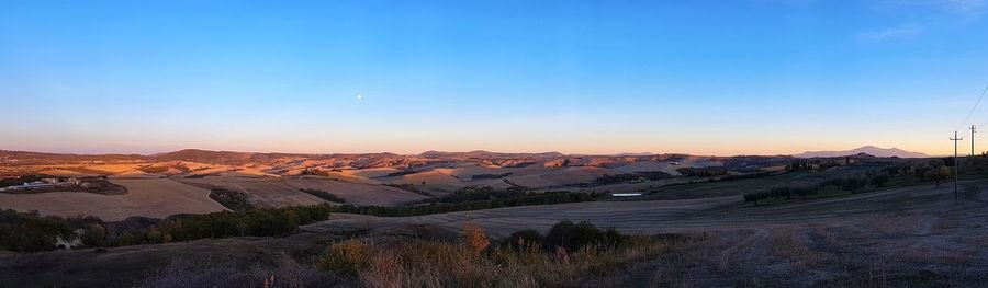 View of landscape against blue sky