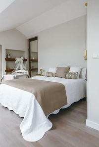 White curtain on bed at home