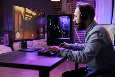 Businesswoman using laptop at home