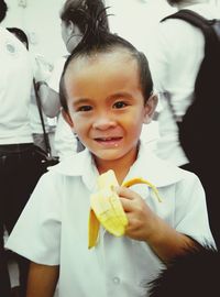 Portrait of cute girl holding ice cream