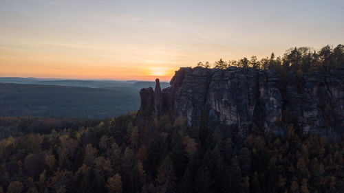 Scenic view of mountains against sky during sunset