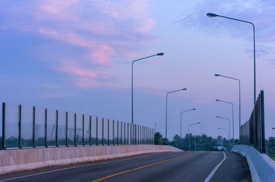 Empty road against sky