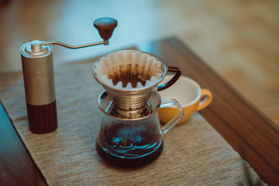 Close-up of coffee cup on table