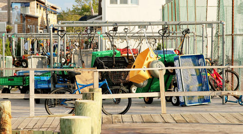 Clothes drying on railing against buildings in city