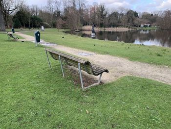 Scenic view of park by lake