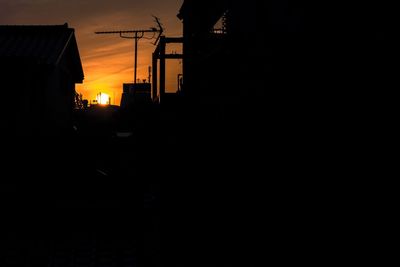 View of built structures at sunset