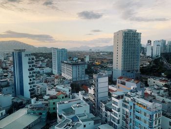 High angle view of buildings in city against sky