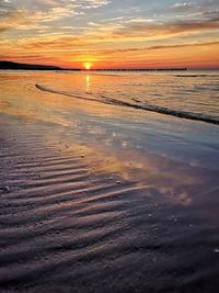 Scenic view of beach during sunset