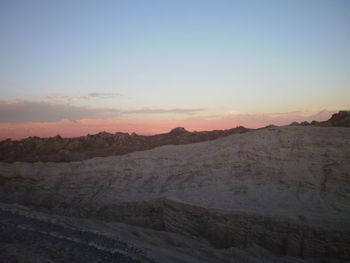 Scenic view of mountains at sunset