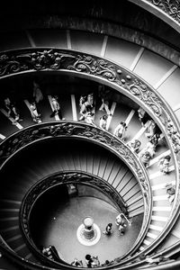 High angle view of people on spiral staircase at vatican museums