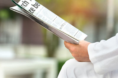 Close-up of man using mobile phone