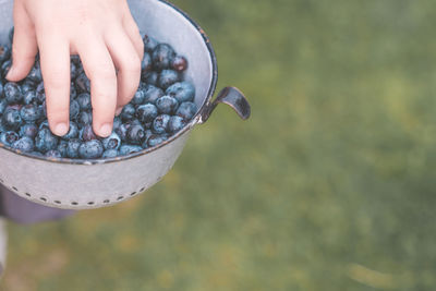 Midsection of boy holding ice cream