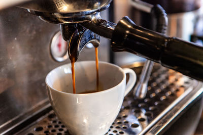 Close-up of coffee cup on table