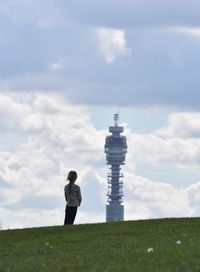 Bt tower and girl against sky, primrose hill 