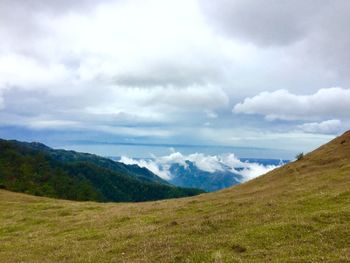 Landscape with mountain range in background