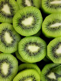 Full frame top view of kiwi halves