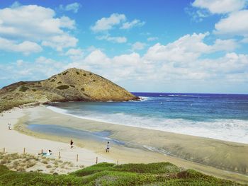 Scenic view of beach against sky