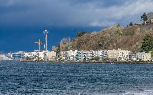 A view of condominiums at alki beach in west seattle, washington.