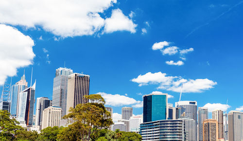 Modern buildings in city against sky