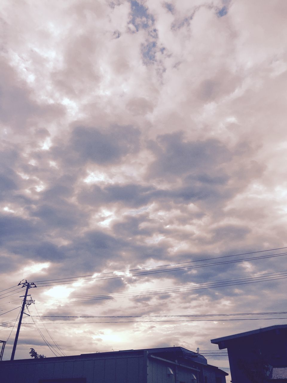 sky, low angle view, cloud - sky, cloudy, power line, silhouette, electricity, electricity pylon, cable, connection, weather, cloud, power supply, fuel and power generation, built structure, overcast, nature, outdoors, dusk, no people