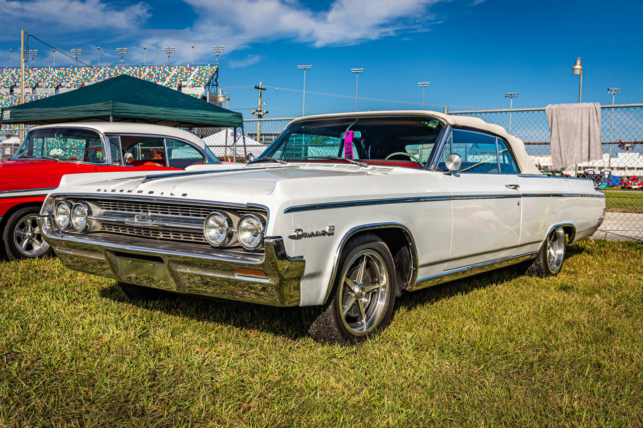 VINTAGE CAR AGAINST BLUE SKY