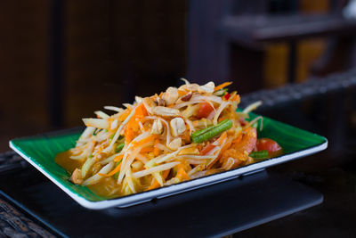 Close-up of food in plate on table