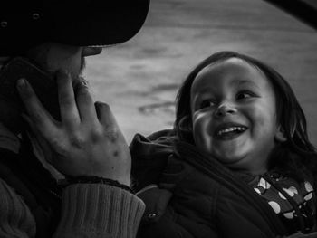 Portrait of happy mother with daughter