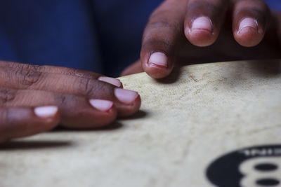 Close-up of person holding hands