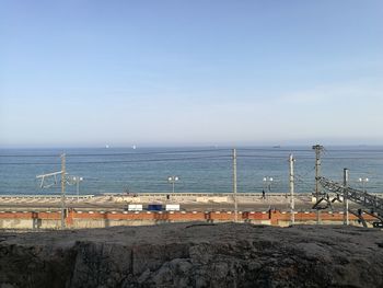 Scenic view of sea against clear blue sky