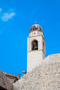 Clock tower of dubrovnik old town seen from the city old port