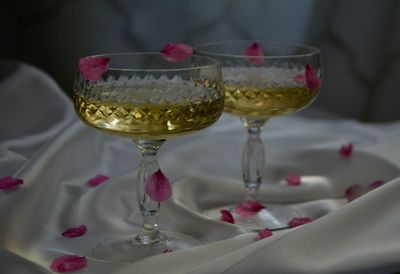 Close-up of red wine in glass on table